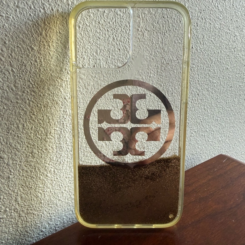 Tory Burch Transparent Phone Case with Gold and Glitter Details